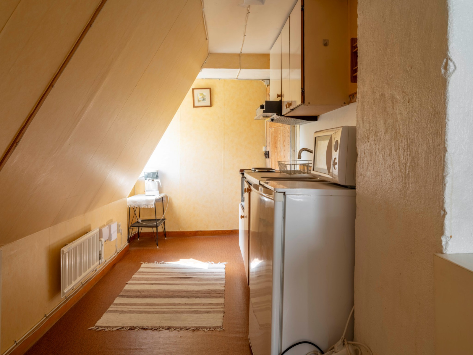 Övre plan, öster, med entré från gården Lybska gränd 4